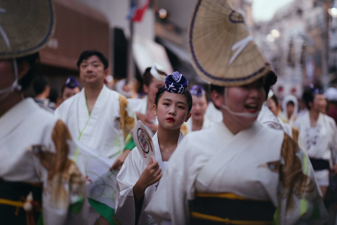 Dancers with amigasa hats Awa Odori festival Koenji Tokyo Japan